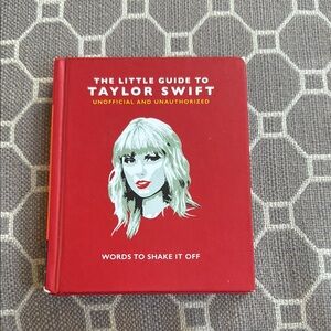Red 'The Little Guide to Taylor Swift' Book